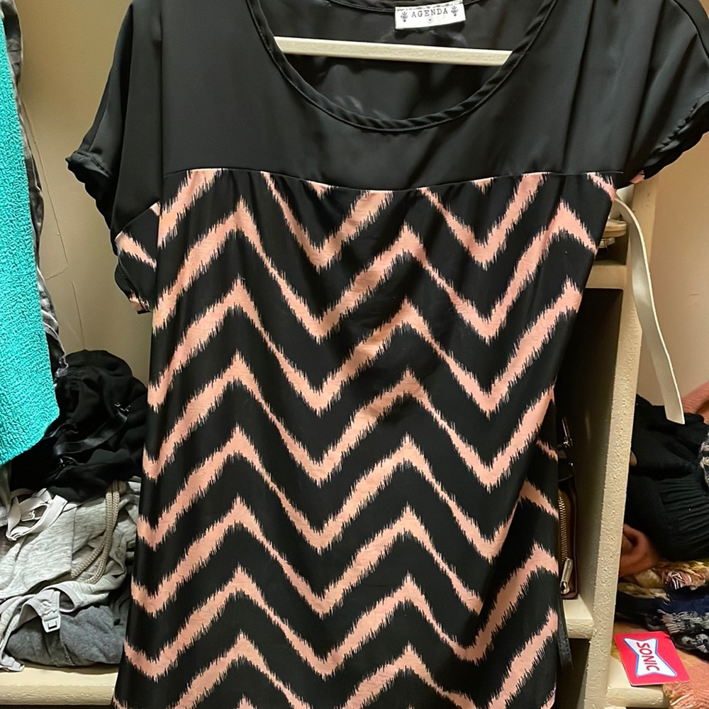 Top size medium. Beautiful top! New without tags